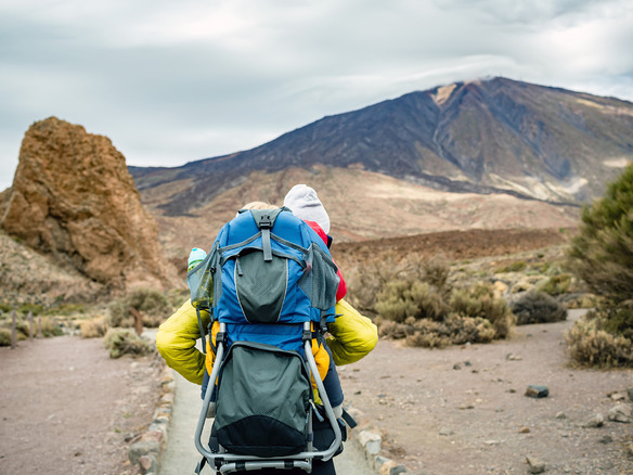 super mom with baby boy hiking in backpack 2024 09 23 05 05 03 utc